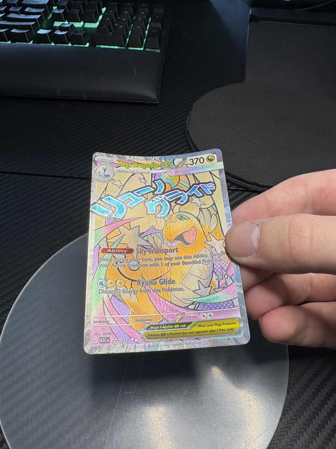 Bent Mega Dragonite ex card before restoration