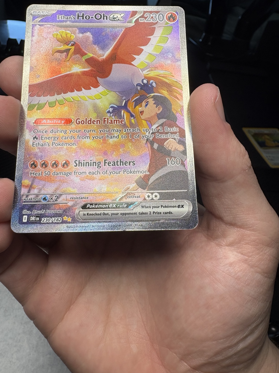 Ethan's Ho-Oh ex card before restoration